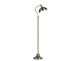 Le lampadaire est doté d'un pied en métal et d'un abat-jour blanc