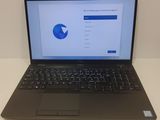an image of a laptop with a pie chart on the screen