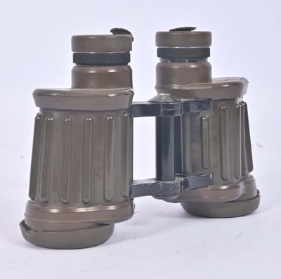 a pair of binoculars that are sitting on a table