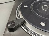 a turntable that is sitting on top of a table