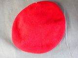 a red hat sitting on top of a table