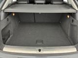 a trunk of a car with the back seats folded down