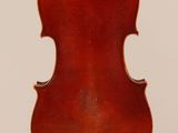 an old violin with a wooden back and a long neck