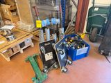 a lot of tools that are sitting on the floor