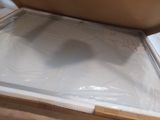 a cardboard box that is sitting on top of a cardboard box