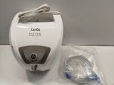 a white and gray blender sitting on a counter