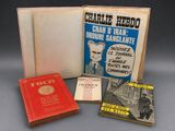 trois livres sont posés les uns à côté des autres sur une table