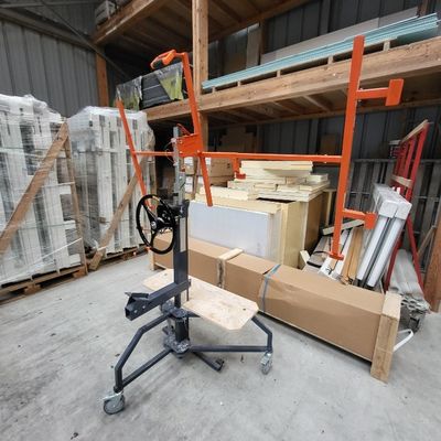 boxes and pallets are stacked on pallets in a warehouse