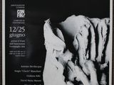 a black and white photo of a poster on a wall