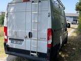 a van that is parked on the side of the road