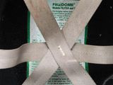 a close up of a seat belt with a tag on it