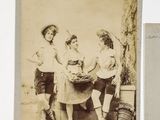 two old black and white photos of a woman and two children