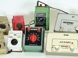 many different types of electronic devices sitting on a white surface