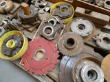 many different types of metal parts on a pallet