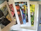 a lot of different pictures on the table together