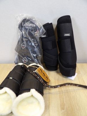 a pair of boots and a pair of boots on a table