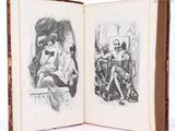 an old book with a drawing of a man and a woman sitting on a bench