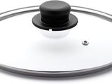 un couvercle en verre muni d'un bouton noir