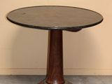 an image of a round table with a wooden base