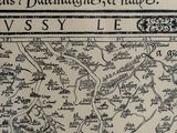 a black and white map of a town on the wall