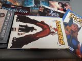 a lot of comic books sitting on a table