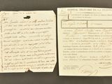 an old document with a piece of paper attached to it
