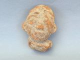 une image représentant une figurine en argile représentant un homme