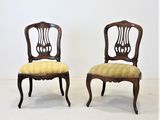 pair of antique dining chairs with upholstered back and upholstered seat
