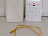 a yellow cable connected to a white cell phone