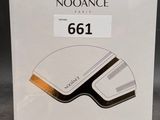 an image of a white box with a black and gold logo