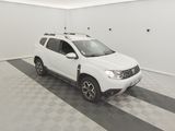 a picture of a white car parked in a garage