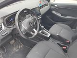the interior of a car with a steering wheel and a dashboard