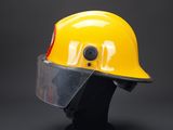 yellow hard hat with clear vise on a black mannequin head
