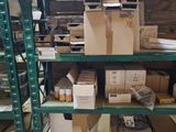 many boxes and boxes on the shelves in the room
