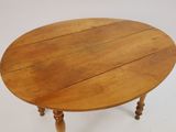 a wooden table with a wooden top on a white background