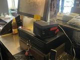 a microwave sitting on top of a counter next to a microwave oven