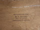 a close up of a piece of wood with a label on it