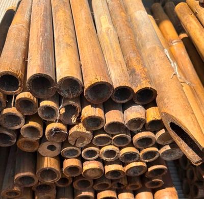 a pile of bamboo sticks stacked on top of each other