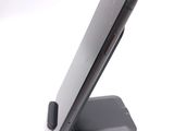 a cell phone that is sitting on a stand
