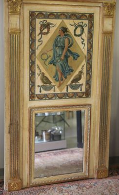 un miroir sur lequel est représentée une femme