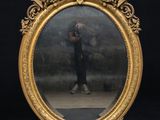 a picture of a man taking a picture of himself in a mirror