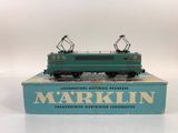 a blue box with a green train on top of it