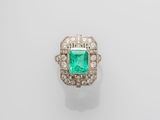 an emerald and diamond ring
