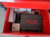 a red box with a black box inside of it