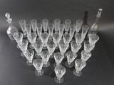 a lot of empty wine glasses sitting on a table