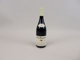 a bottle of red wine on a white background