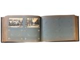 an open book with a picture of a boat in the water