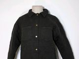 an image of a black jacket on a mannequin mannequin