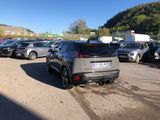 a lot of cars parked in a parking lot