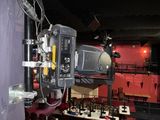 an image of a movie projector set up in a theater